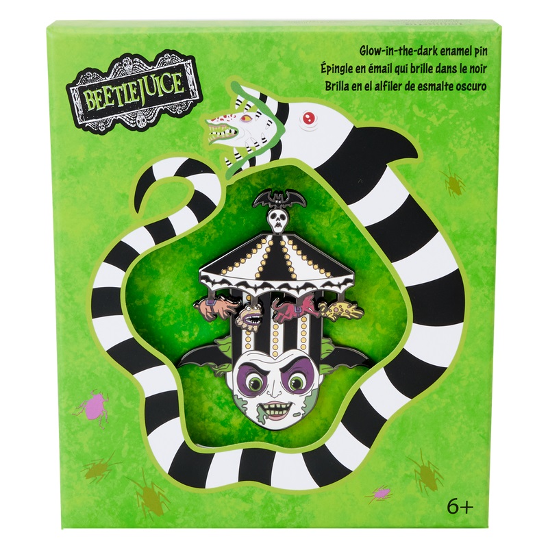 An enamel pin of Beetlejuice wearing his carousel hat in a collector box.