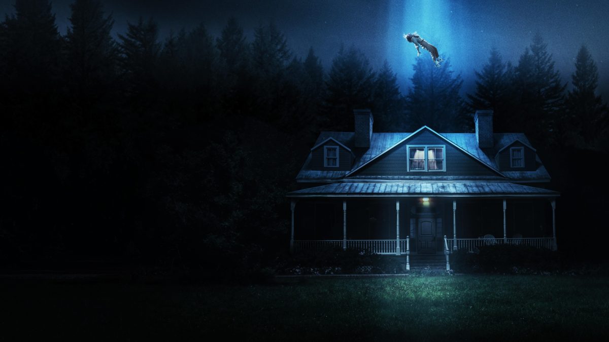 A woman is lifted from a house by an alien tractor beam in "No One Will Save You"