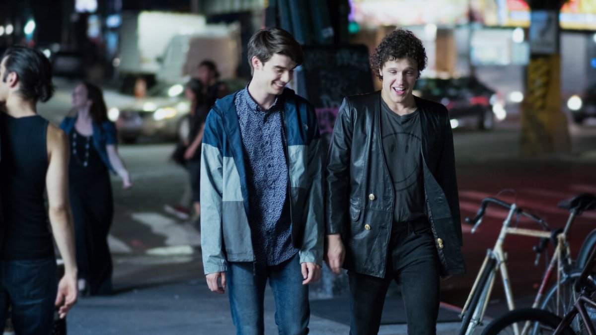 L-R: Alex Truelove (Daniel Doheny) and Elliot (Antonio Marziale) walking side-by-side together at night