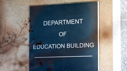 Signage on the side of the Department of Education Building