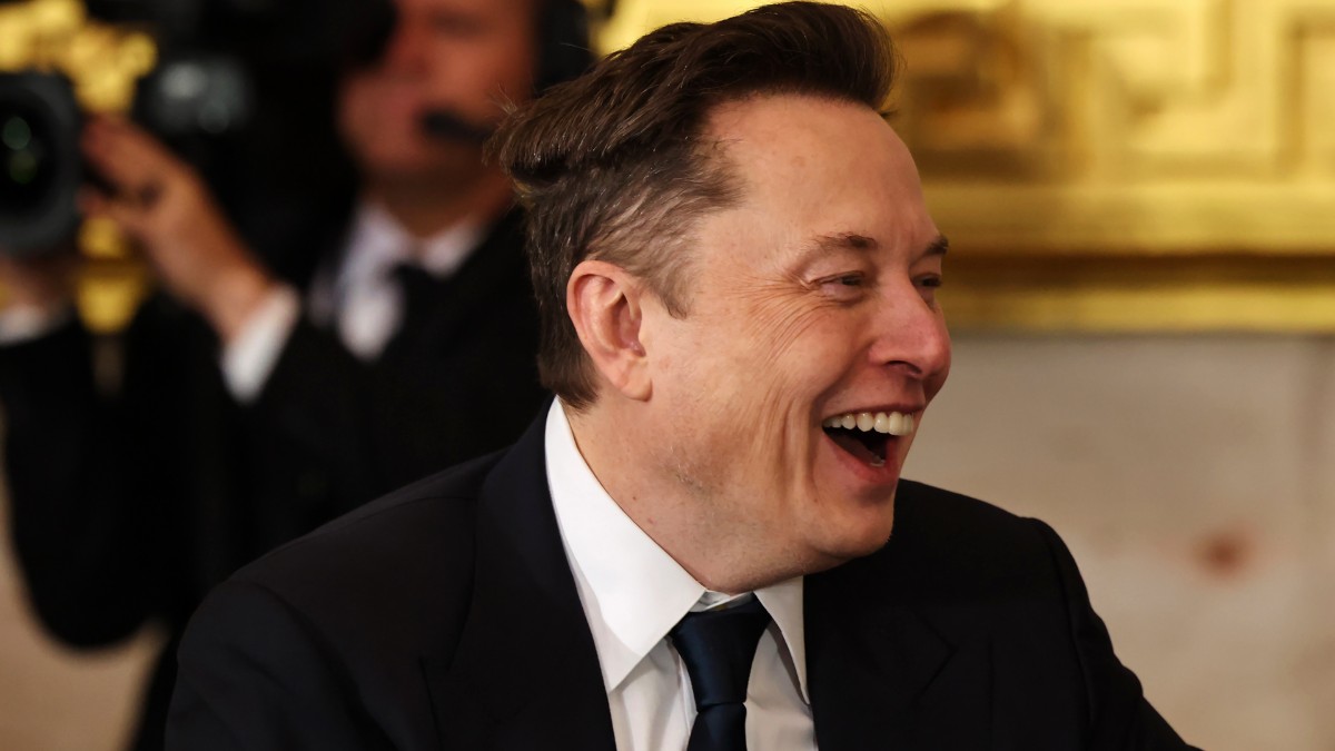 Elon Musk laughing at Donald Trump's inauguration ceremony