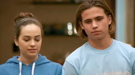 Mary Mouser as Sam and Tanner Buchanan as Robby in Cobra Kai