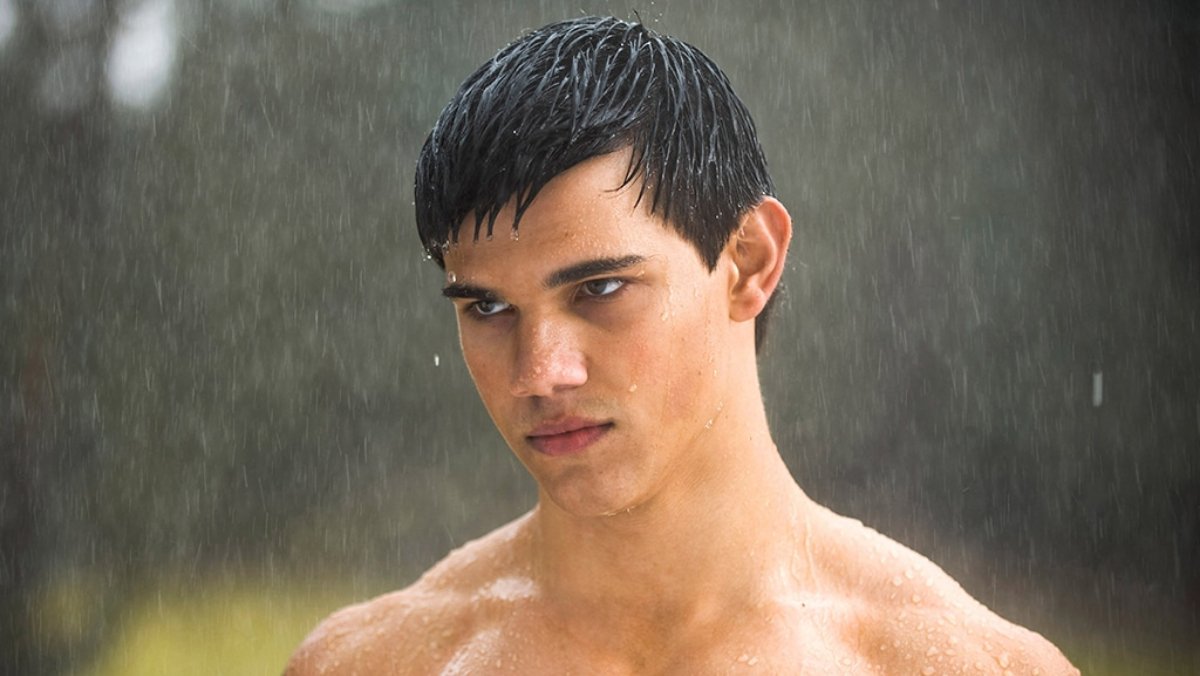 Taylor Lautner as Jacob Black standing shirtless in the rain in 'Twilight'
