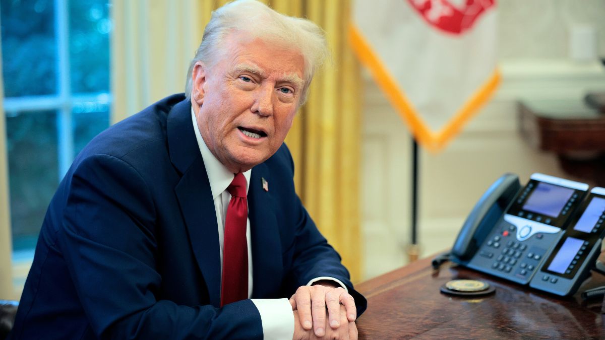 WASHINGTON, DC - JANUARY 30: U.S. President Donald Trump talks to reporters from the Resolute Desk after signing an executive order to appoint the deputy administrator of the Federal Aviation Administration in the Oval Office at the White House on January 30, 2025 in Washington, DC. Trump also signed a memorandum ordering an immediate assessment of aviation safety and ordering an elevation of what he called “competence” over “D.E.I.” (Photo by Chip Somodevilla/Getty Images)