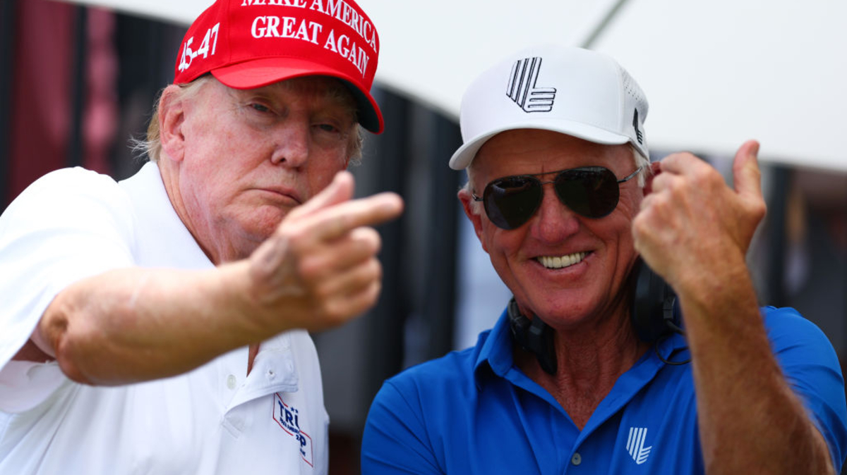 Former U.S. President Donald Trump and LIV Golf CEO Greg Norman speak at the first tee during day three of the LIV Golf Invitational - Miami at Trump National Doral Miami on April 07, 2024 in Doral, Florida.