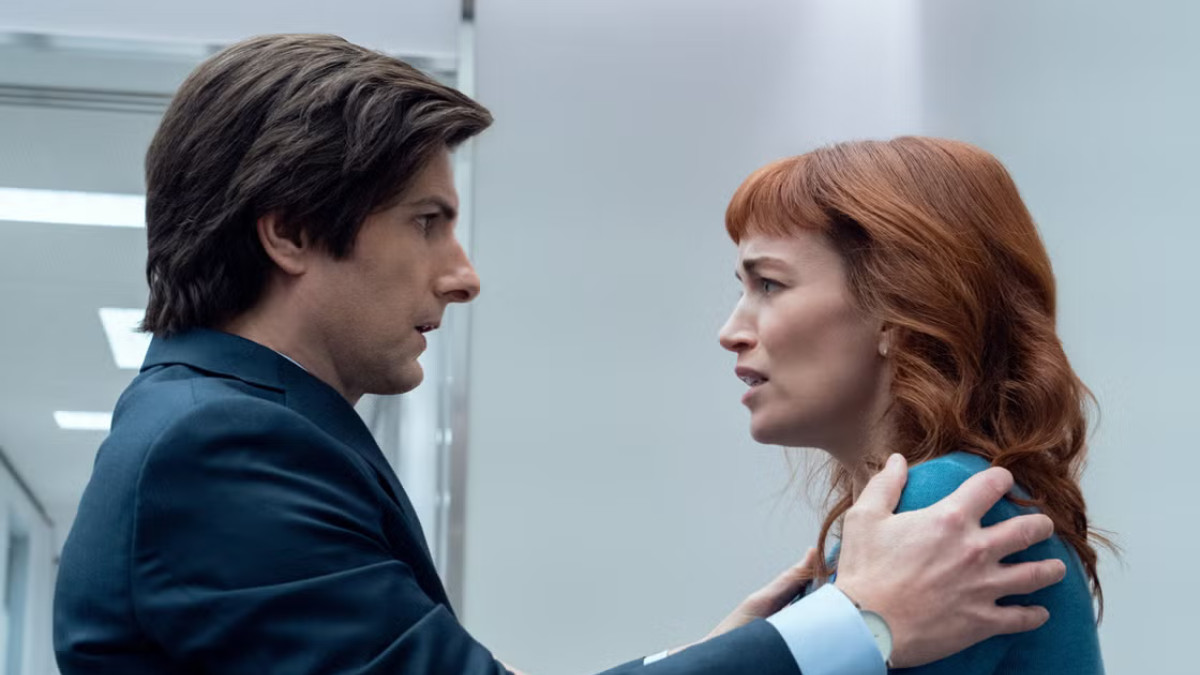 Adam Scott holding Britt Lower's shoulders in Severance