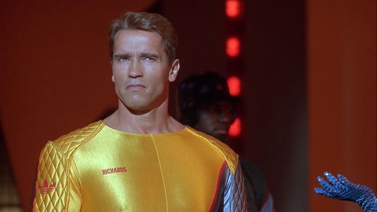 Arnold Schwarzenegger as Ben, looking shocked