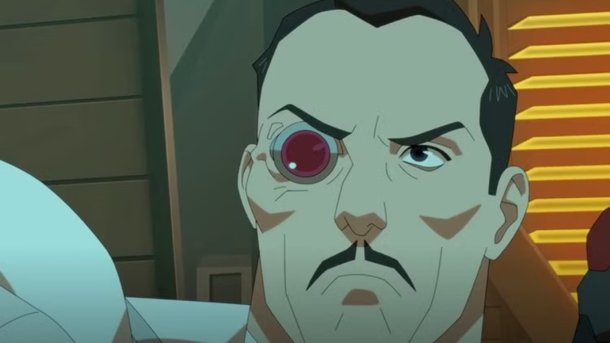 A man with a cybernetic eye frowns in "Invincible"
