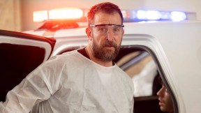 the pitt's doctor robby standing