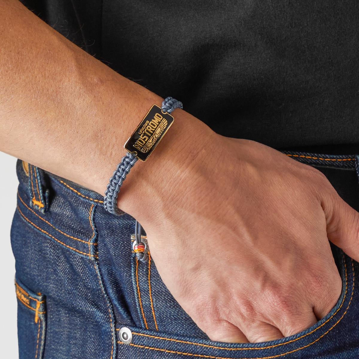 a hand with a bracelet on the wrist