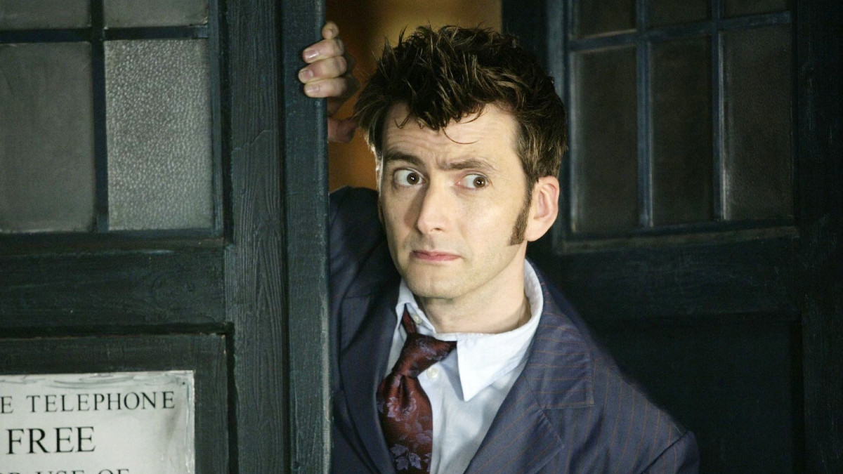 David Tennant as the TEnth Doctor, standing in the doorway of the TARDIS in Doctor Who