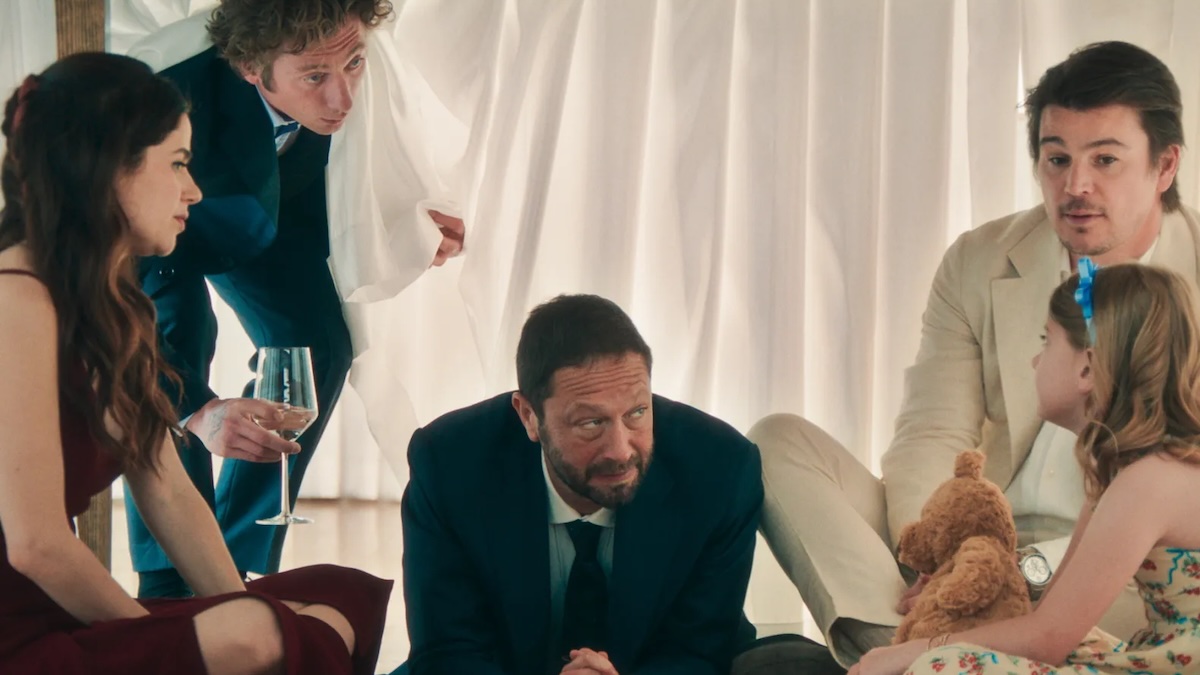 a bunch of adults under a table