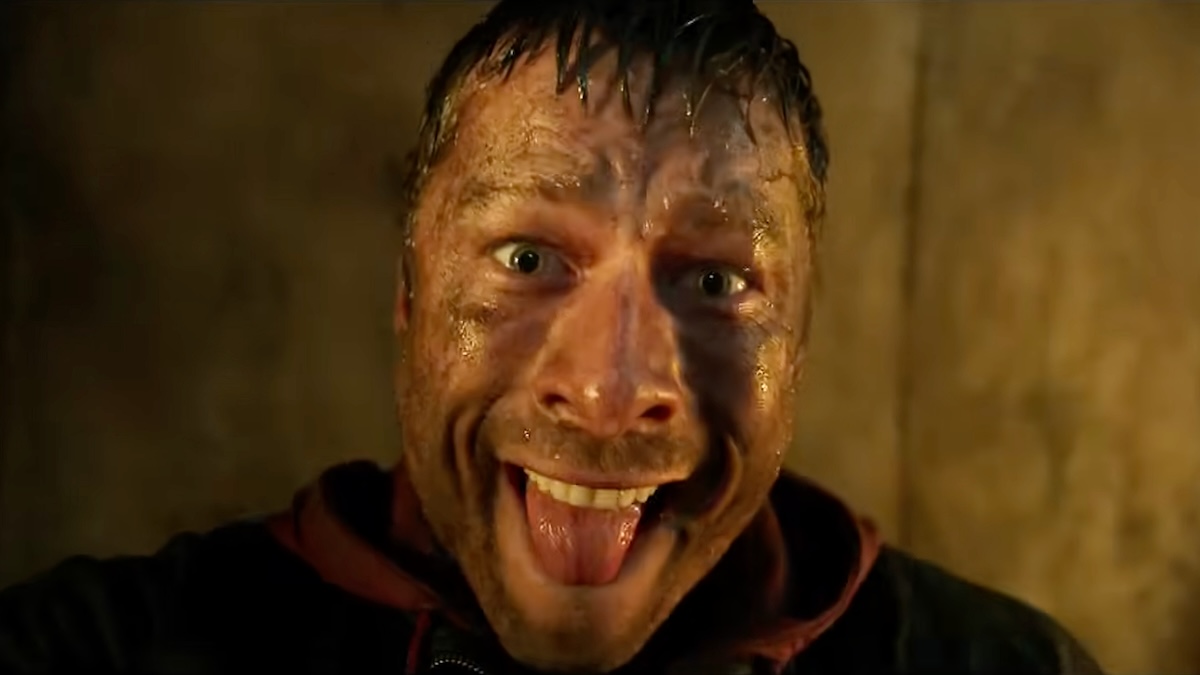 glen powell looking at the camera