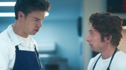 the bear two men looking at each other