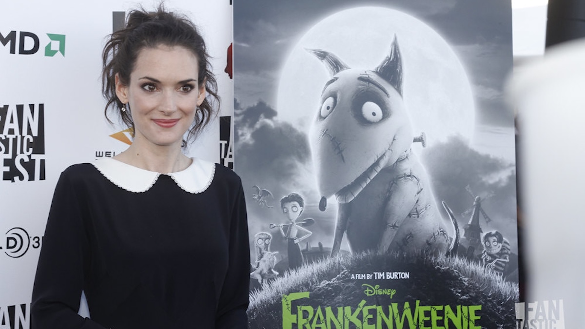 winona ryder standing on a carpet