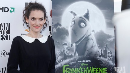 winona ryder standing on a carpet