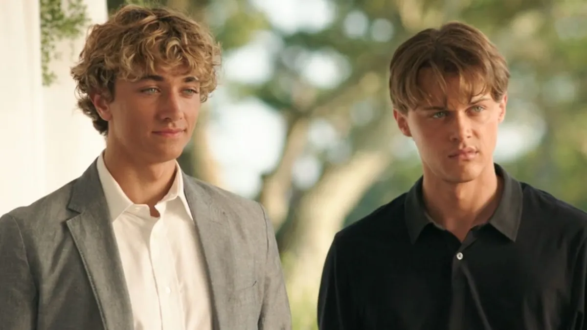 conrad and jeremiah standing next to each other