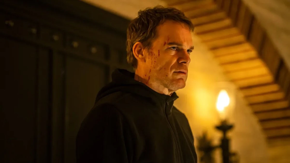 dexter standing in a black shirt