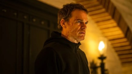 dexter standing in a black shirt