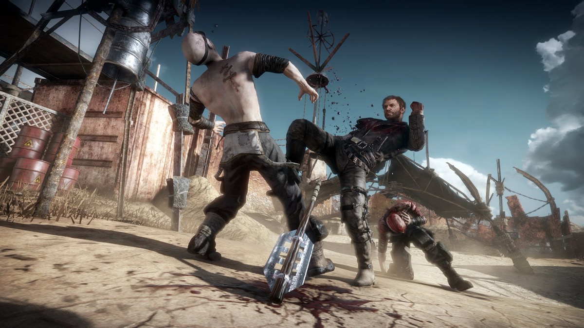 A man kicks a mutant in the head in "Mad Max"