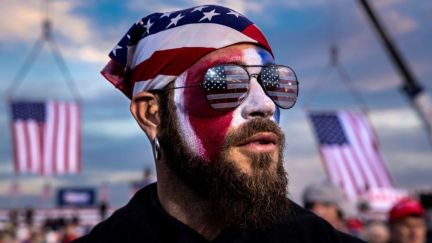 DALTON, GA - JANUARY 4: Jacob Anthony Angeli Chansley is seen at a Trump rally on January 4, 2021 in Dalton, Georgia. Chansley, known as the QAnon Shaman, attended the Capitol riots on the 6th of January in Washington, DC. On January 9, Chansley was arrested on federal charges of 