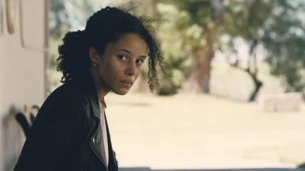 chase infiniti sitting in a chair