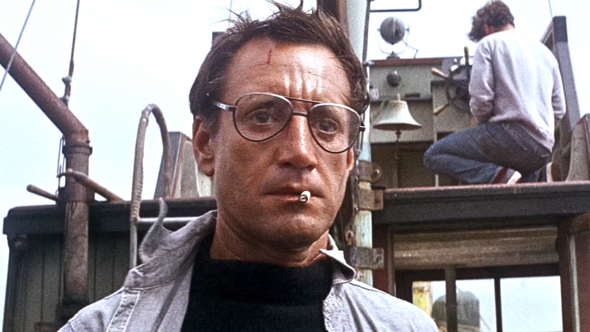 man looking straight ahead on a boat