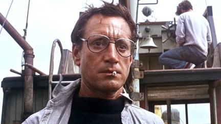 man looking straight ahead on a boat