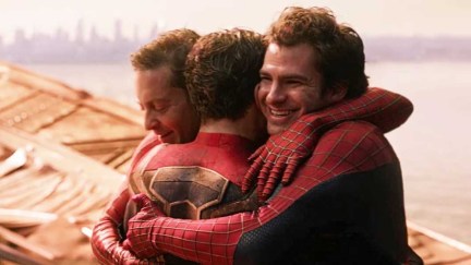 three spider-man hugging