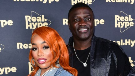 Tomeka Thaim and Akon at an event. (Photo by Vivien Killilea/Getty Images for Real Hype Creative)