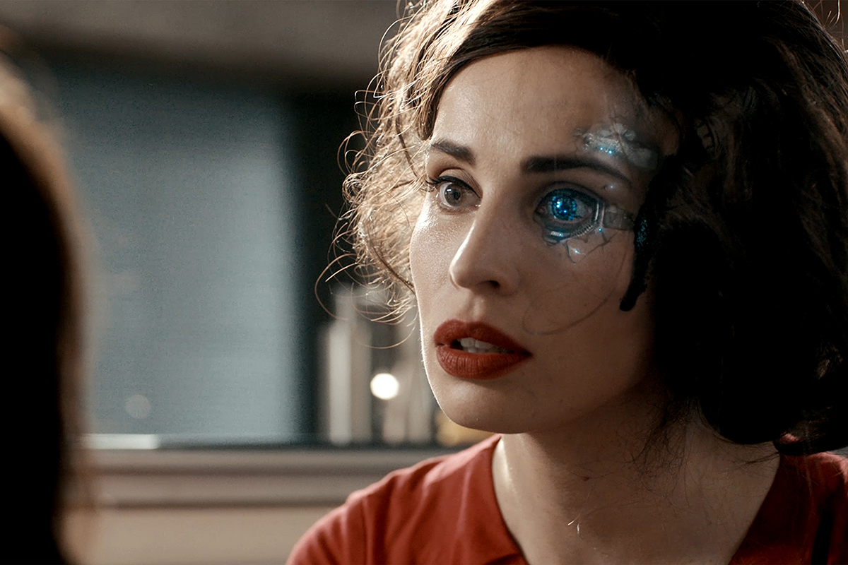 An android stares blankly at a person in "Blank" 