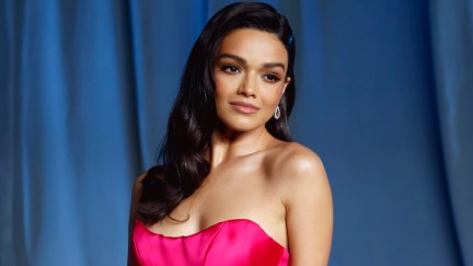 rachel zegler posing on a red carpet