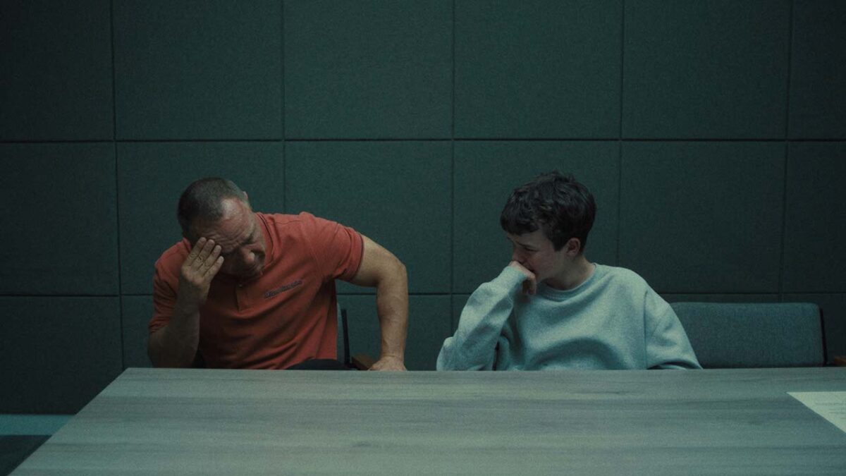 A father gets emotional with his teenage son in "Adolescence" 