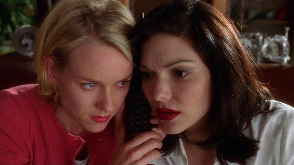 Two women listen intensely to a phone call in "Mulholland Drive"