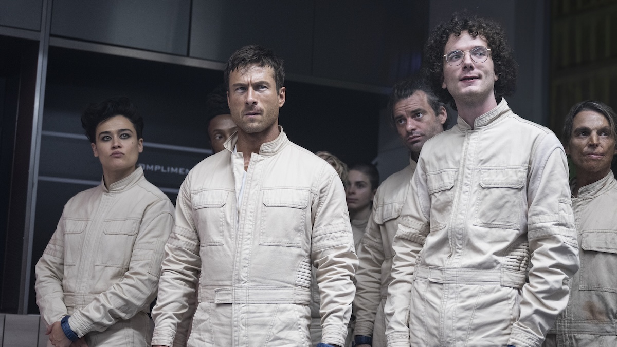 glen powell standing with katy o'brian and martin herlihy