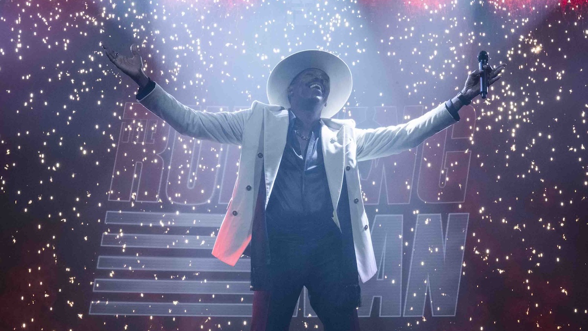 colman domingo with arms open