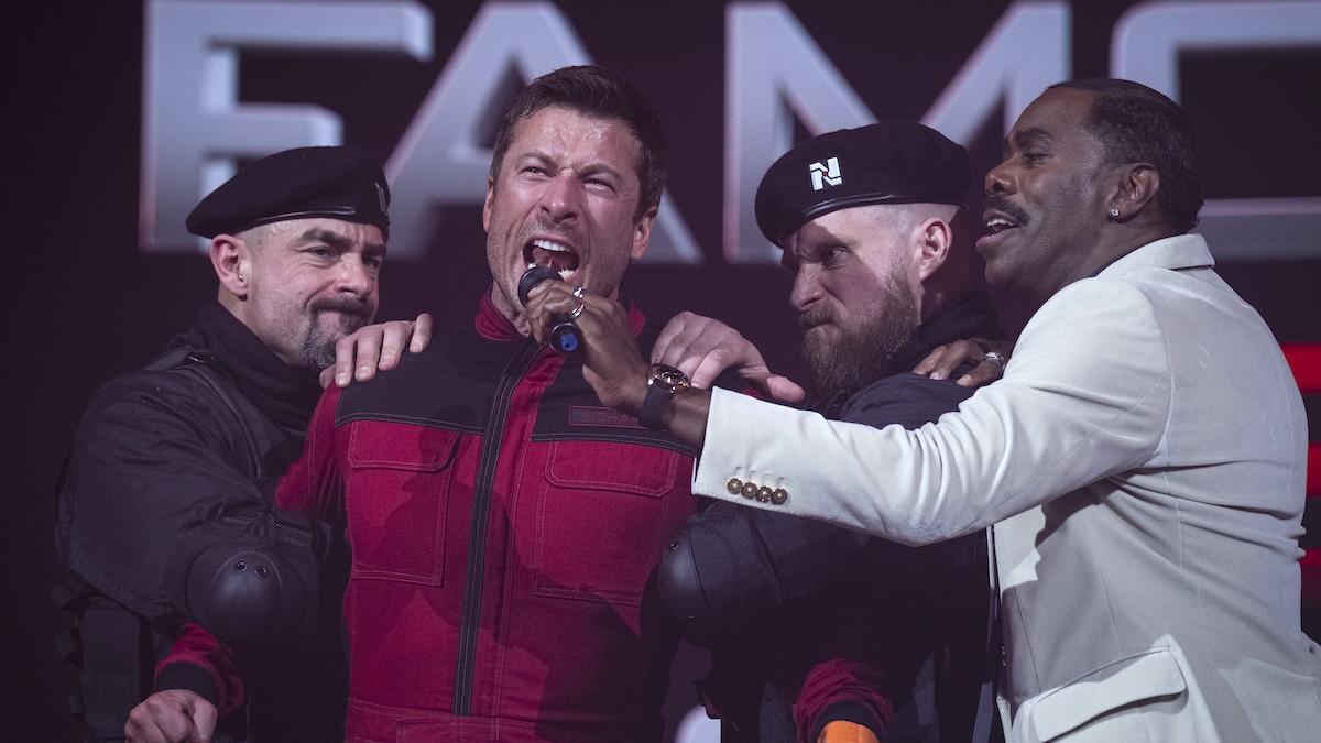 Glen powell yelling into colman domingo's mic in the running man