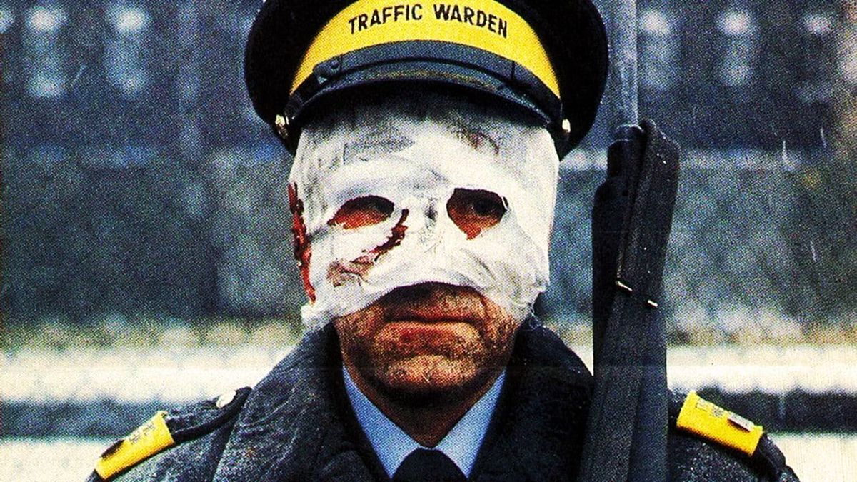 A policeman stands with a bandage over his face in "Threads"