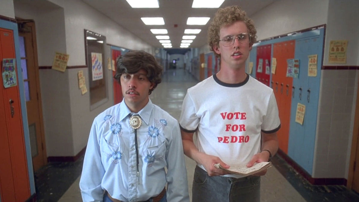 Two awkward teens stand in a high school hallway in "Napoleon Dynamite"