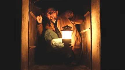 adam scott with a light