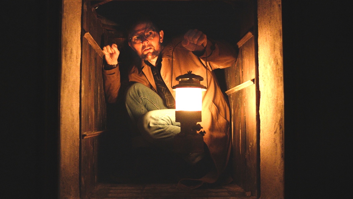 adam scott with a light