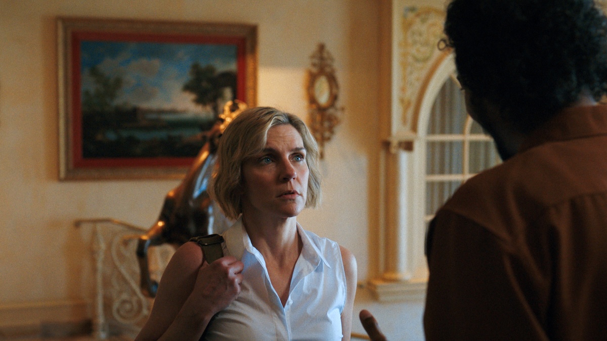 carol looking at mr. diabate on pluribus