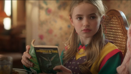 Holly reading A Wrinkle in Time on Stranger Things