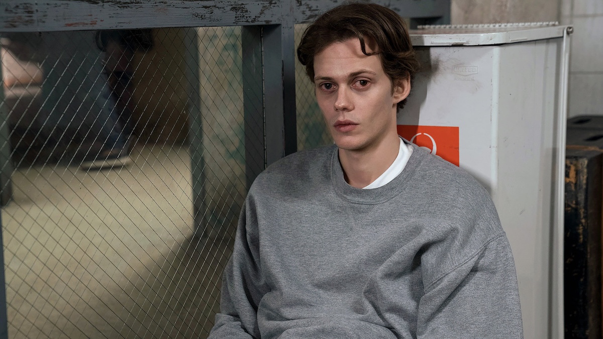 man sitting in a sweatshirt