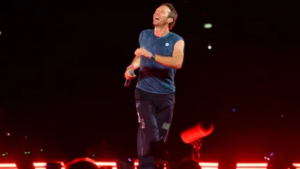 chris martin on stage
