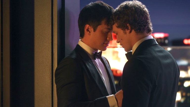 two men with their foreheads touching