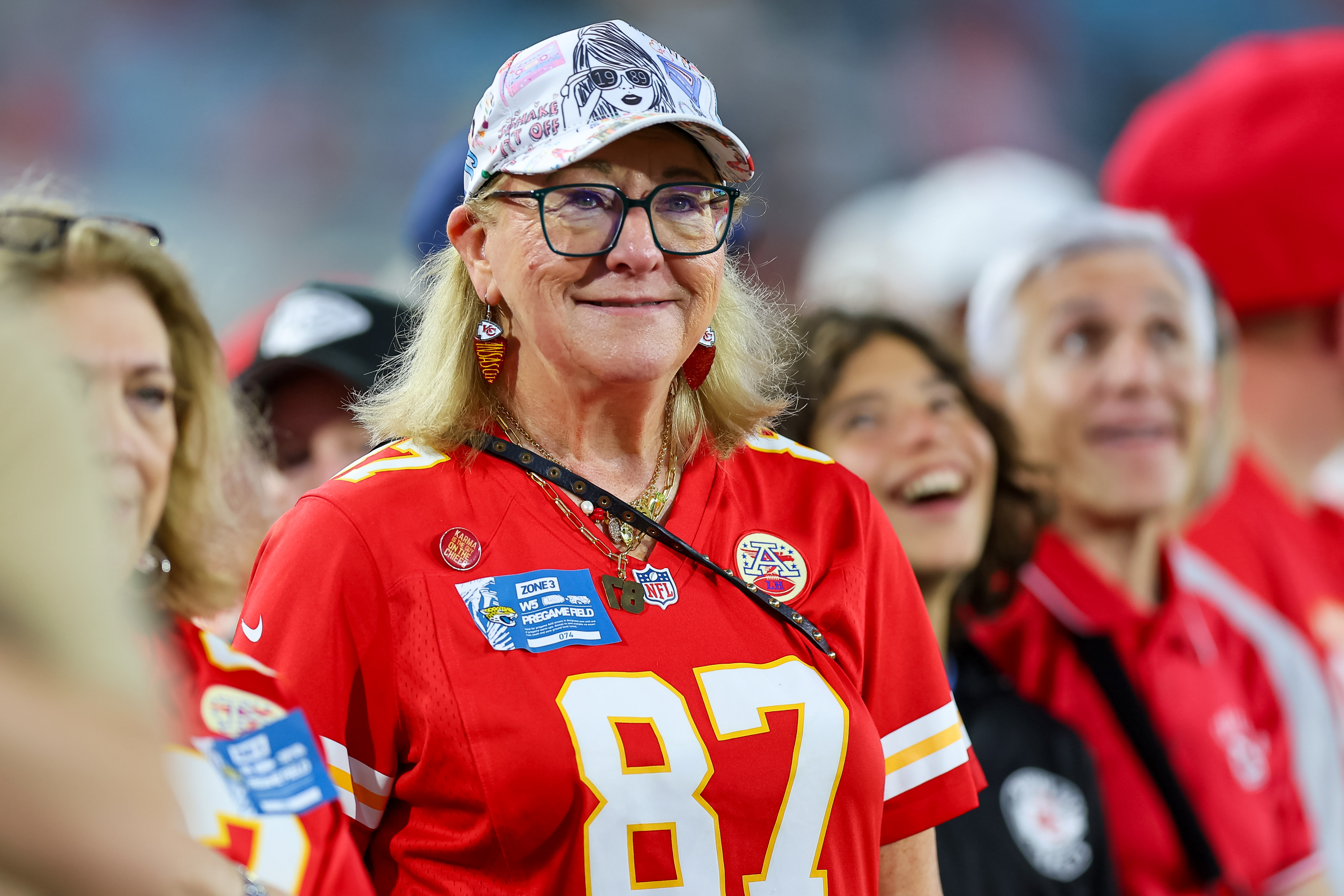Donna Kelce wears a Taylor Swift themed hat prior an NFL game