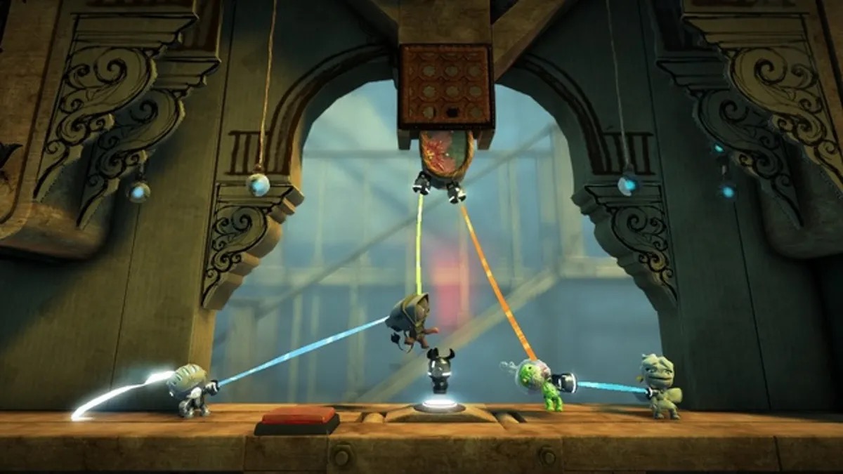 A group of sackboys shoot lasers in "LittleBigPlanet 2"