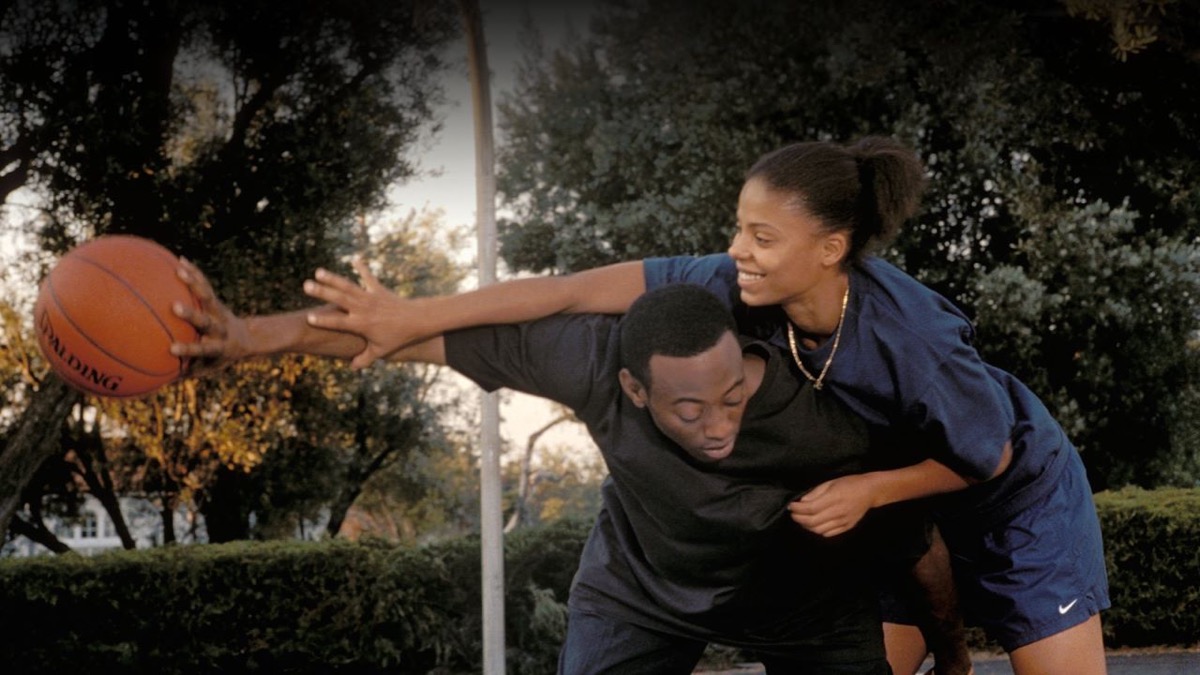 A couple playfully play basket together in "Love And Basketball" 