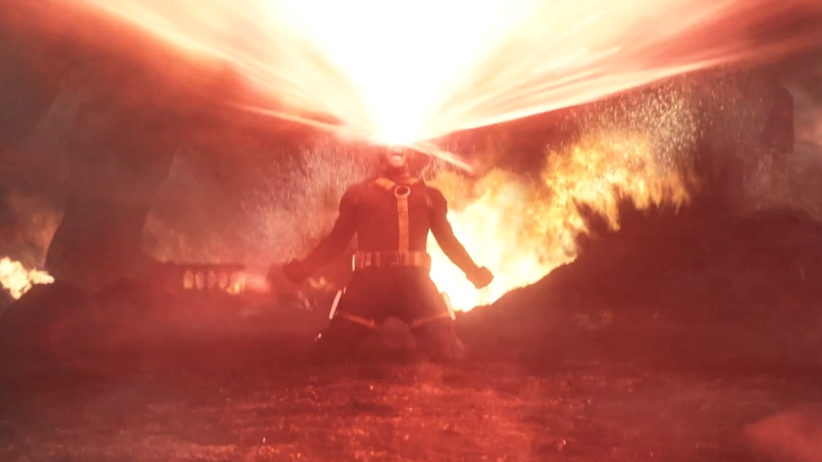 man crying surrounded by red